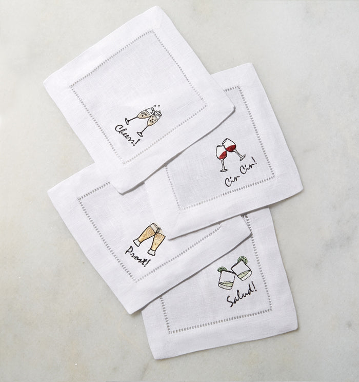 SFERRA Cheers cocktail napkins feature a cheerful selection of four drinks on hemstitched linen napkins.