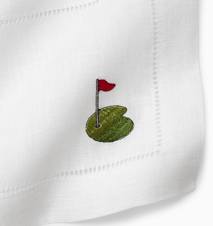 Golf cocktail napkins with the putting green, flag and hole.