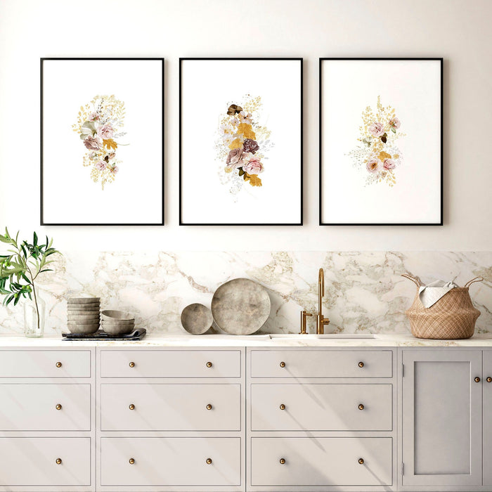 Three framed botanical floral prints above grey kitchen cabinets, inspiring kitchen wall decor ideas