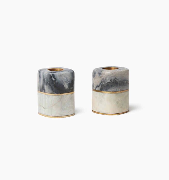 Lunario marble-textured candle holders with gold accents