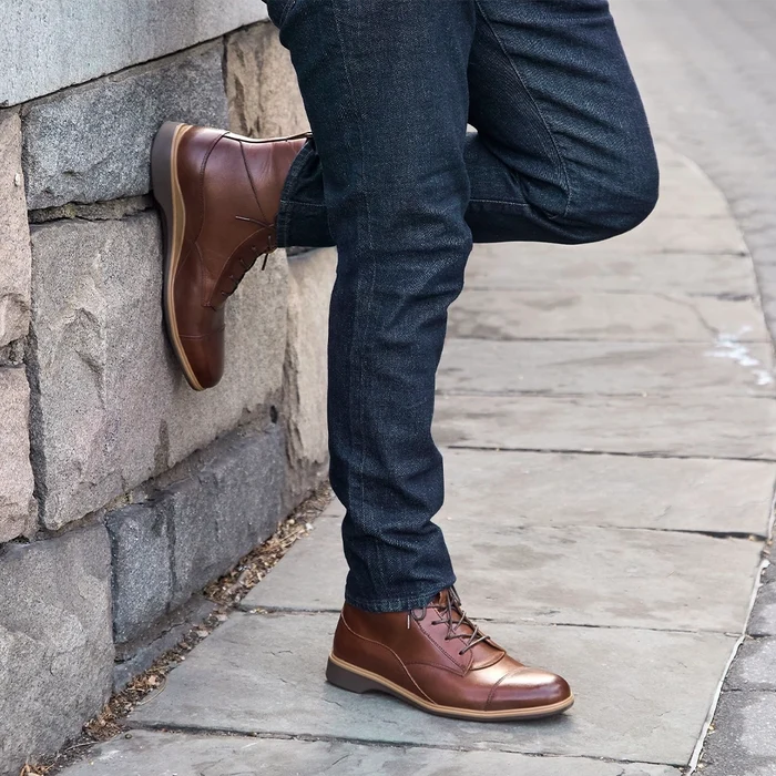 The Boot by Amberjack in Chestnut Brown Leather - Worn with Black Jeans on model