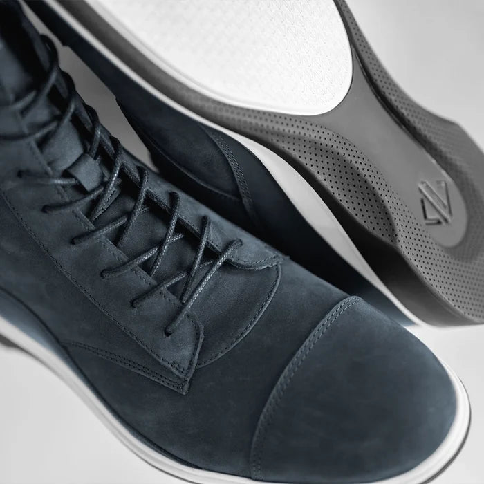 close up photo of details of cobalt blue suede and outsole