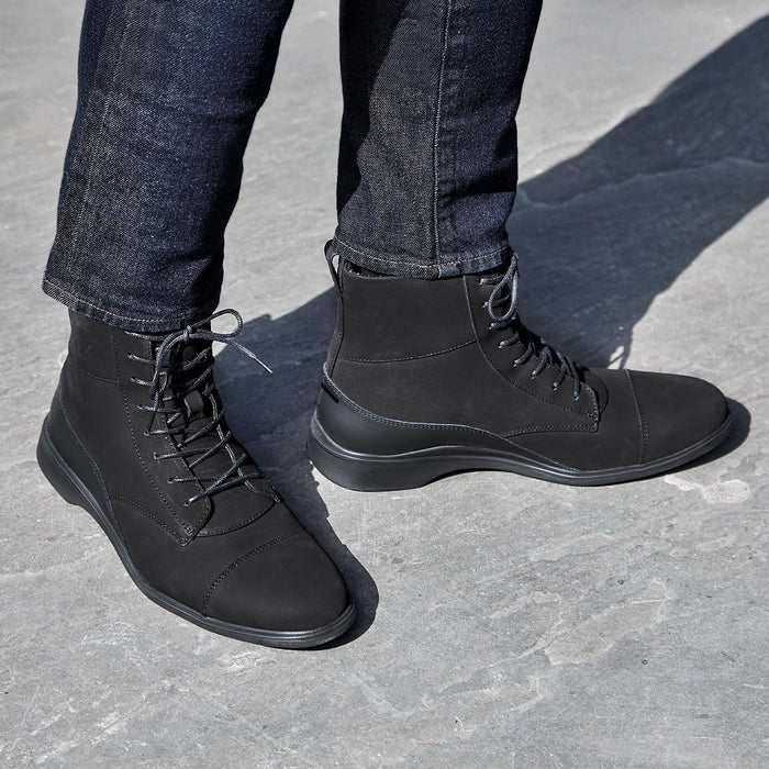 model wearing the boot midnight dark jeans