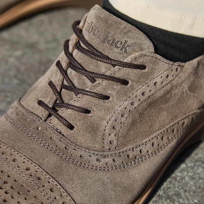 The Cap-Toe Slate close up detail photo of Italian suede and sheepskin lining