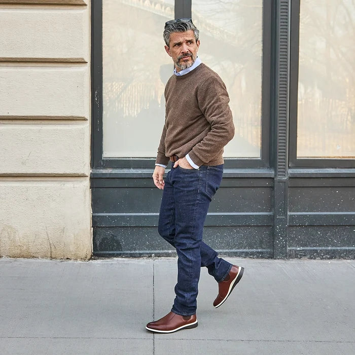 model wearing the chelsea coffee with dark jeans and brown sweater