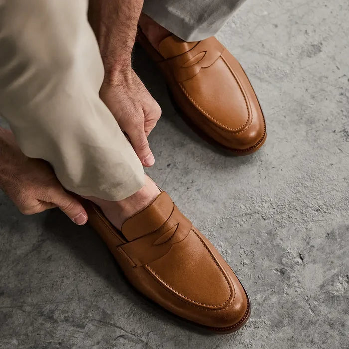 Model wearing The Duke in Honey tan full-grain leather with light khakis
