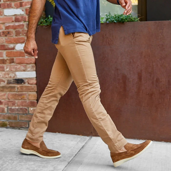The Loafer by Amberjack in Grizzly Brown Suede - Worn on model walking in tan pants