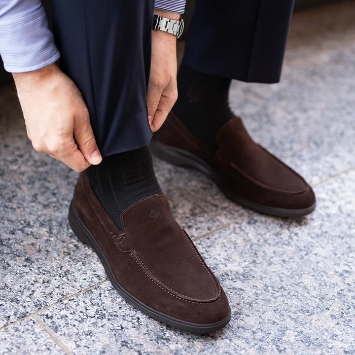 Model wearing The Loafer by Amberjack in Walnut brown suede - with dark blue dress pants
