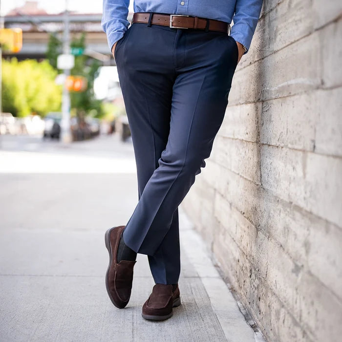 Model wearing The Loafer by Amberjack in Walnut brown suede - with dark blue dress pants
