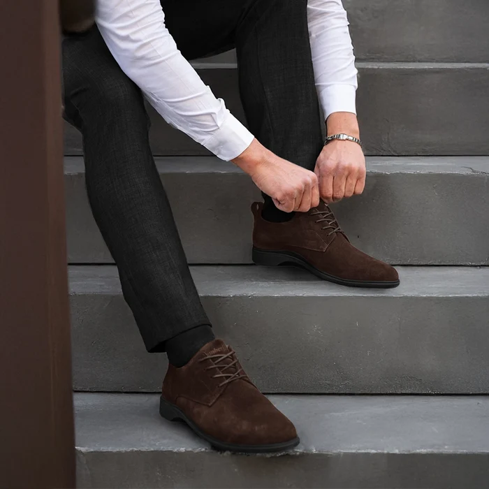 model wearing the OG Walnut dark brown suede