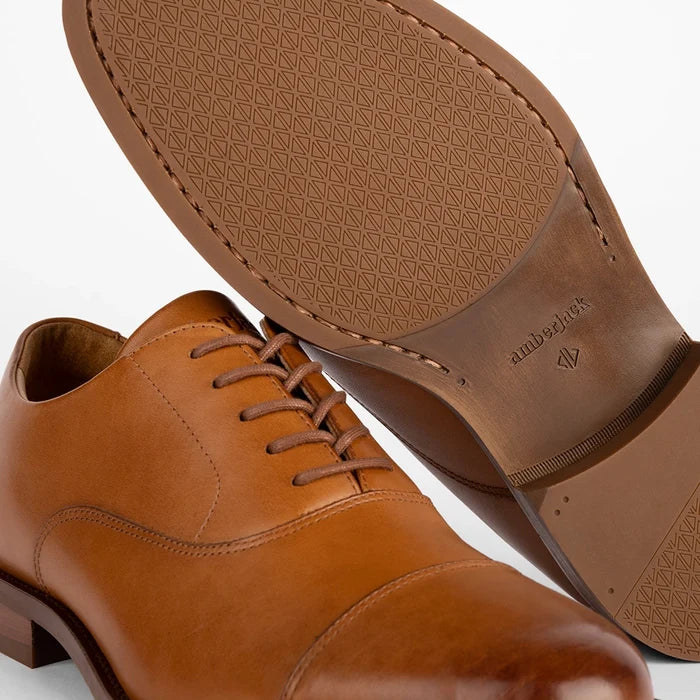 The Regent in Honey tan full-grain leather detail view