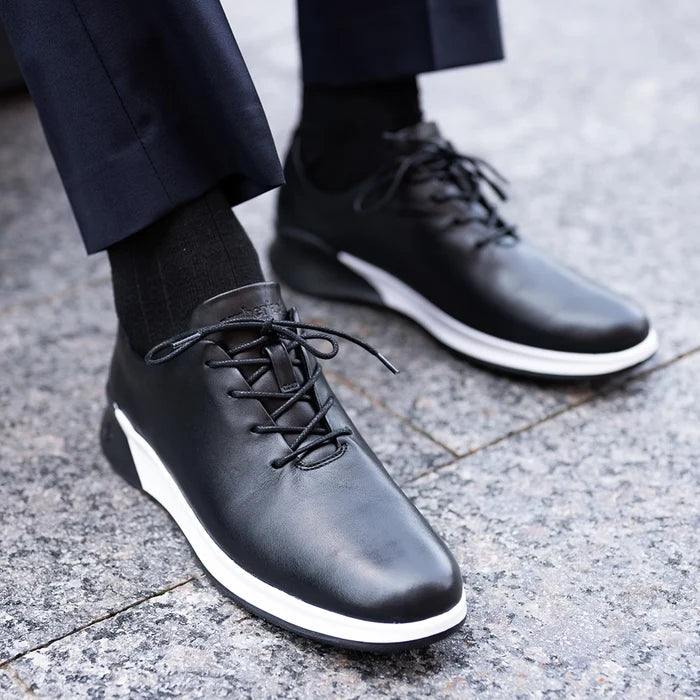 Whole Cut Hybrid Onyx worn by model wearing dark blue dress pants